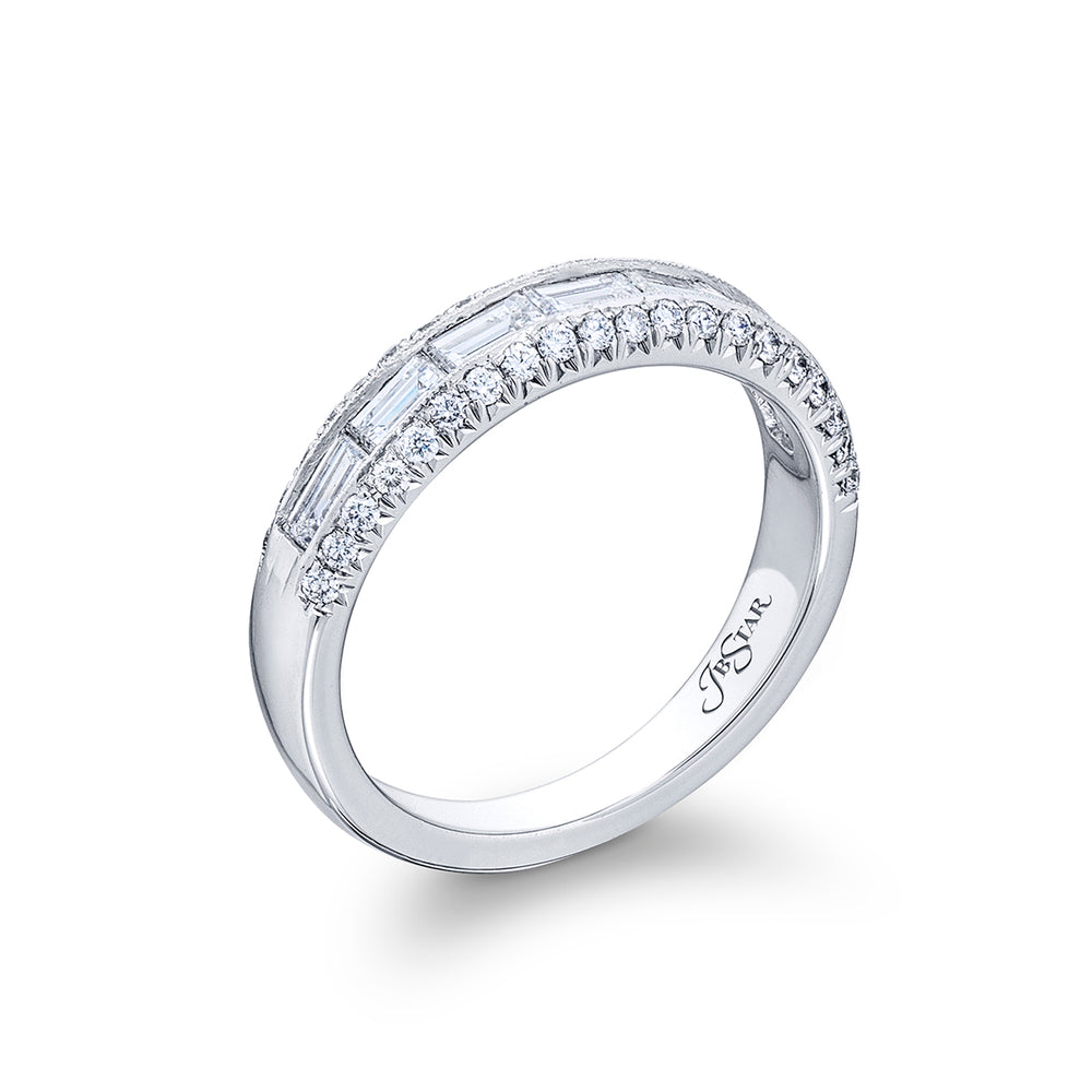 Elegance Elevated: Our signature East-West Channel Diamond Band. These gorgeous seven straight baguette diamonds embraced by micro pave diamonds are handcrafted in pure platinum.