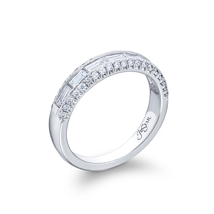 Elegance Elevated: Our signature East-West Channel Diamond Band. These gorgeous seven straight baguette diamonds embraced by micro pave diamonds are handcrafted in pure platinum.