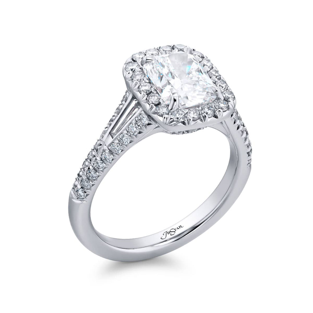 Dazzling Brilliance: Our timeless 1.50 ct. GIA certified Diamond Ring. This beautiful cushion-cut diamond cradled in tapered baguette and micro pave diamonds is handcrafted in pure platinum.