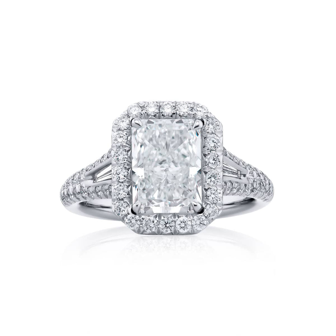Dazzling Brilliance: Our timeless 2.25 ct. GIA certified Diamond Ring. This beautiful radiant-cut diamond cradled in tapered baguette and micro pave diamonds is handcrafted in pure platinum.