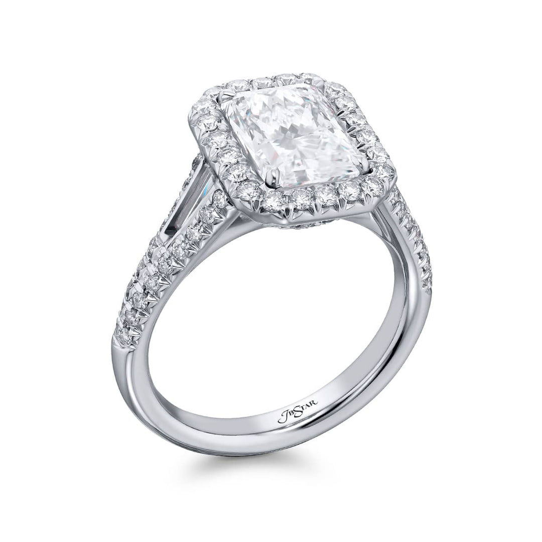 Dazzling Brilliance: Our timeless 2.25 ct. GIA certified Diamond Ring. This beautiful radiant-cut diamond cradled in tapered baguette and micro pave diamonds is handcrafted in pure platinum.