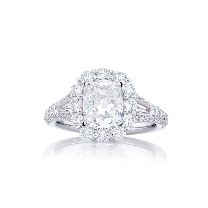Dazzling Brilliance: Our stunning 1.51 ct. GIA certified Diamond Ring. This beautiful cushion-cut diamond cradled in tapered baguette and round diamonds is handcrafted in pure platinum.