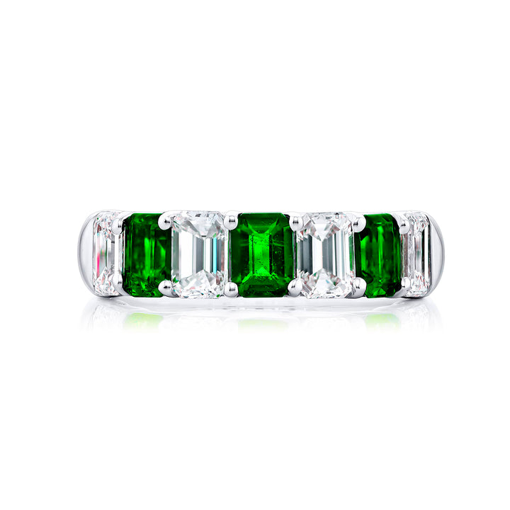 Elegance Elevated: Our classic single row Emerald Band. These beautiful emerald-cut emeralds blended with emerald-cut diamonds are handcrafted in pure platinum.