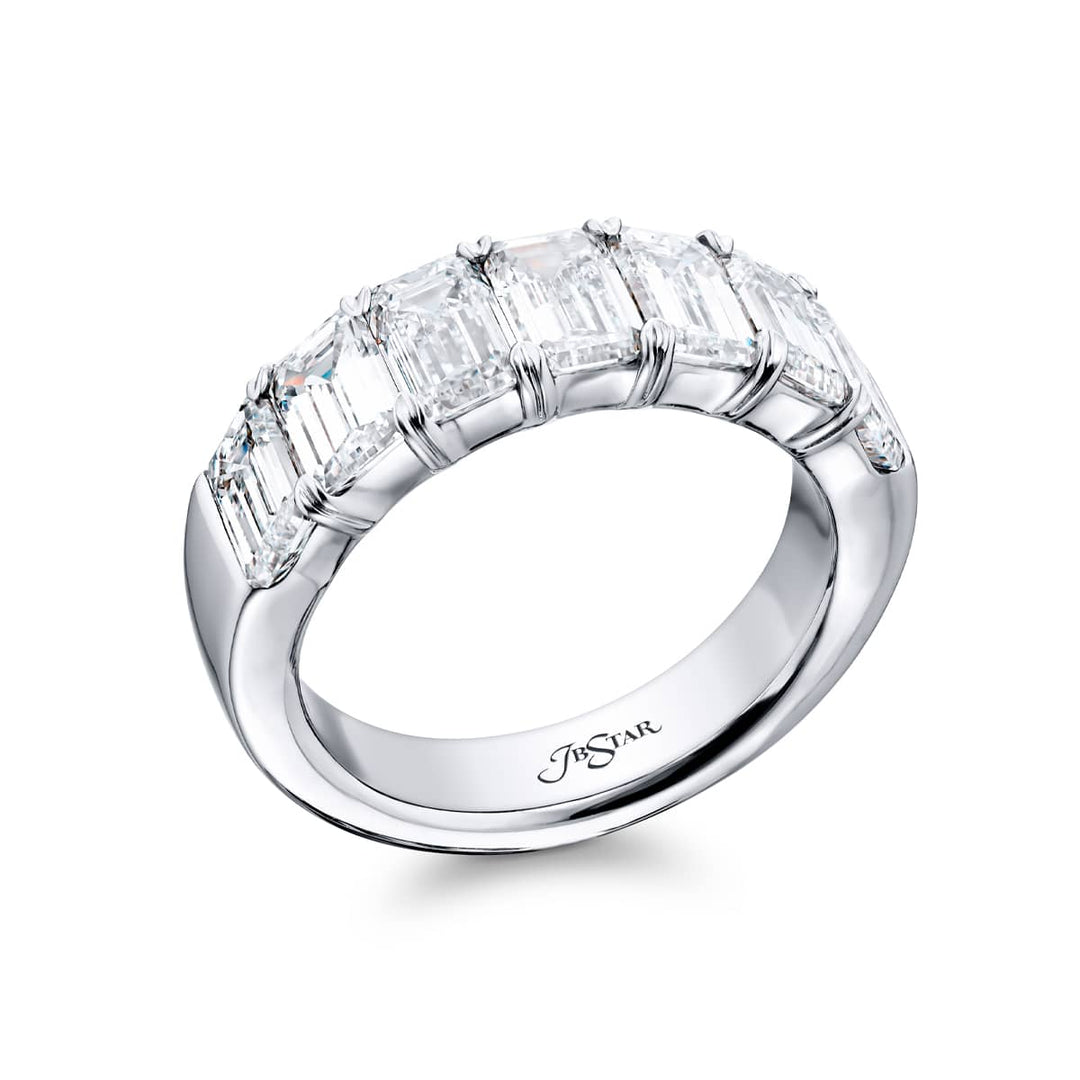 Elegance Elevated: Our stunning 3.73 ctw. GIA certified Diamond Band. These seven beautiful emerald-cut diamonds are handcrafted in pure platinum.