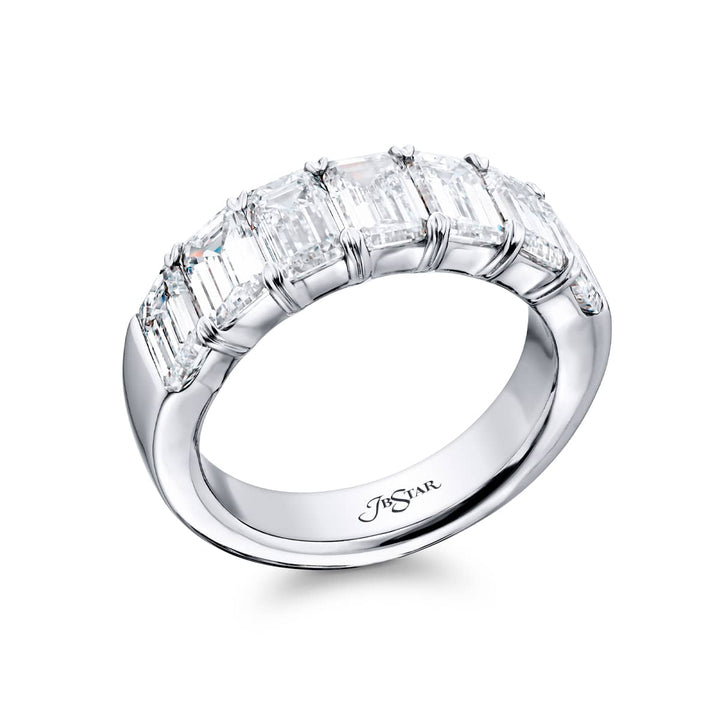 Elegance Elevated: Our stunning 3.73 ctw. GIA certified Diamond Band. These seven beautiful emerald-cut diamonds are handcrafted in pure platinum.