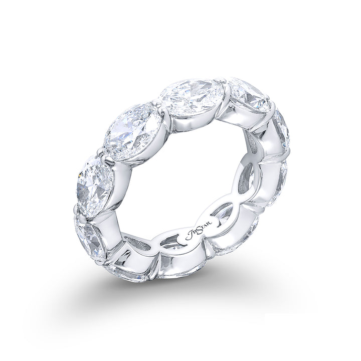 Exquisite in its beauty this diamond eternity band showcases 10 GIA-certified oval diamonds flawlessly set in an east-west orientation with shared prongs. Handcrafted from pure platinum it radiates timeless elegance and allure