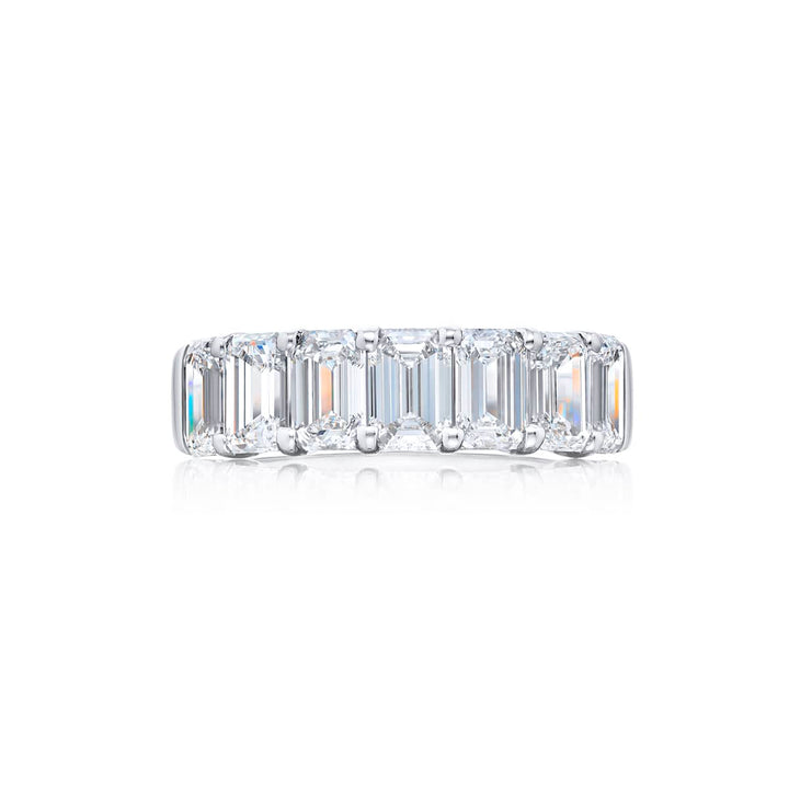 Elegance Elevated: Our stunning single row 3.61 ctw. GIA certified Diamond Band. These seven beautiful emerald-cut diamonds are handcrafted in pure platinum.