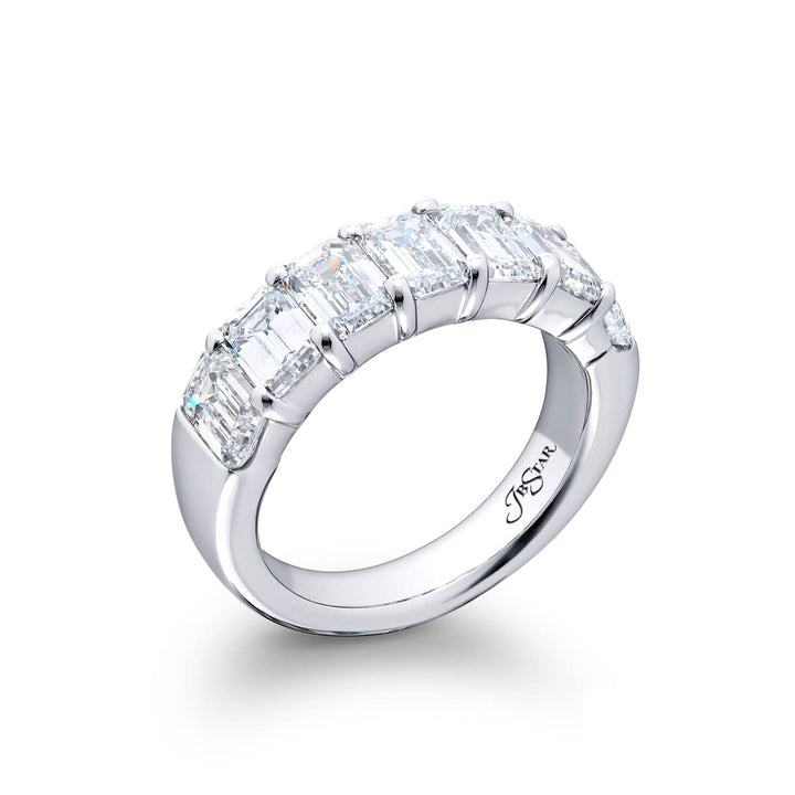 Elegance Elevated: Our stunning single row 3.61 ctw. GIA certified Diamond Band. These seven beautiful emerald-cut diamonds are handcrafted in pure platinum.