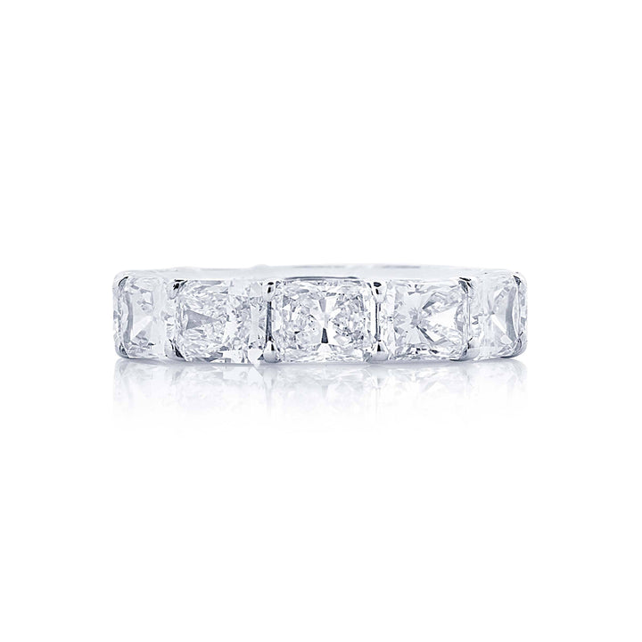Gorgeous diamond eternity band featuring 12 radiant cut diamonds in a shared prong setting. Handcrafted in pure platinum.