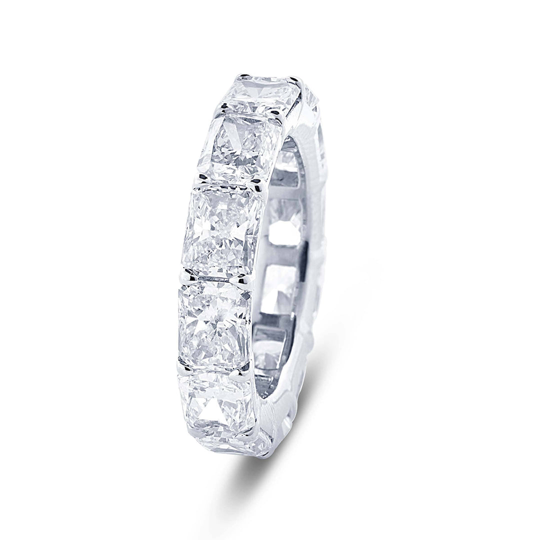 Gorgeous diamond eternity band featuring 12 radiant cut diamonds in a shared prong setting. Handcrafted in pure platinum.