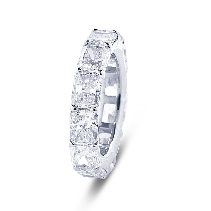 Gorgeous diamond eternity band featuring 12 radiant cut diamonds in a shared prong setting. Handcrafted in pure platinum.