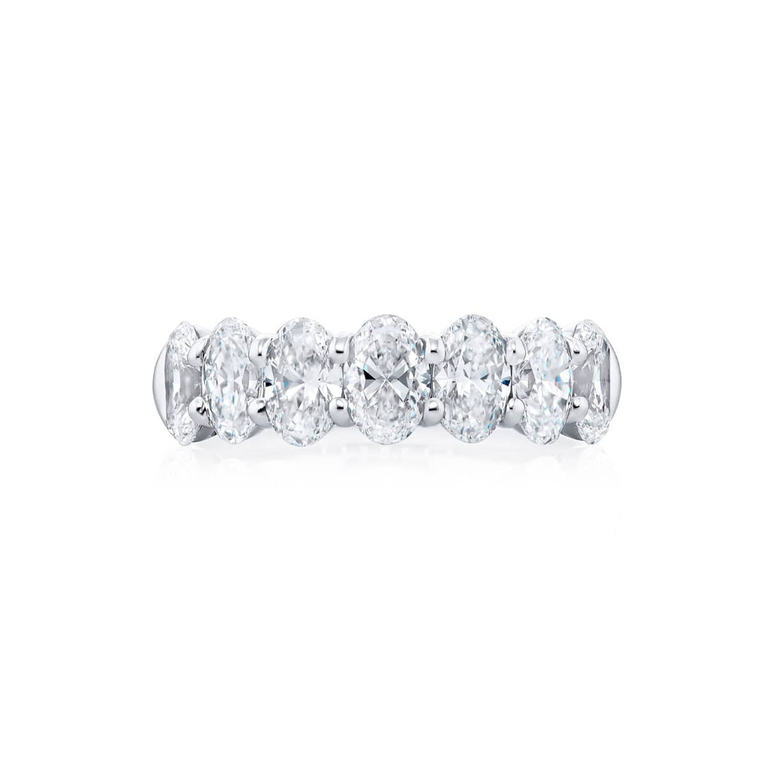 Elegance Elevated: Our signature 2.92 ctw. GIA certified Diamond Band. These seven gorgeous oval diamonds are handcrafted in pure platinum.