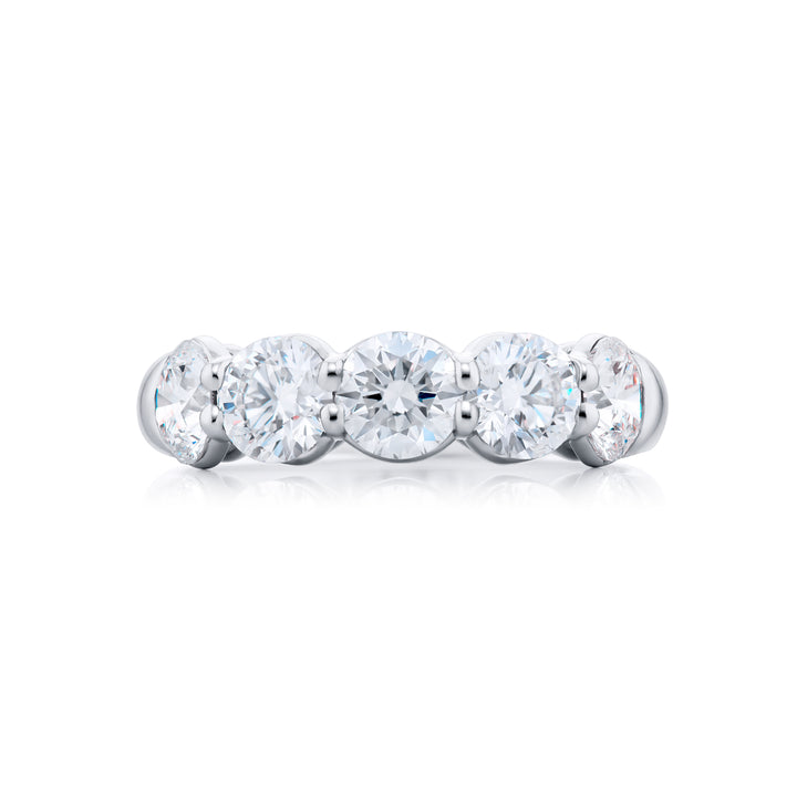 Elegance Elevated: Our signature 2.28 ctw. Diamond Band. These five beautiful round diamonds are handcrafted in pure platinum.
