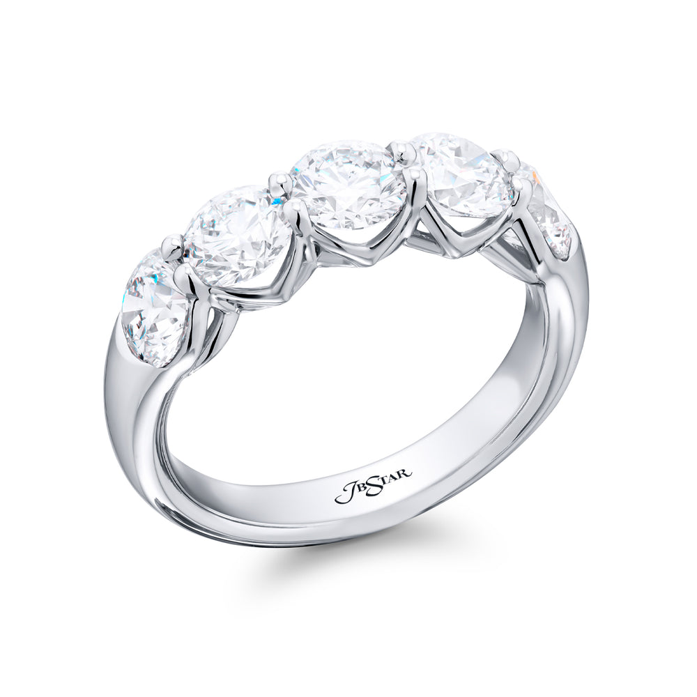 Elegance Elevated: Our signature 2.28 ctw. Diamond Band. These five beautiful round diamonds are handcrafted in pure platinum.