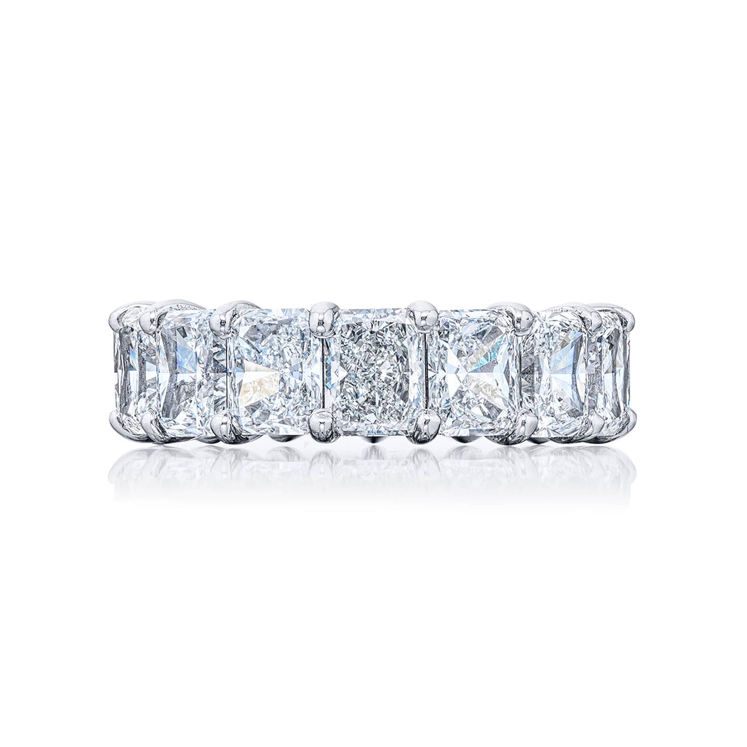 Dazzling diamond eternity band featuring 15 perfectly matched GIA Certified FG/VS radiant cut diamonds in a shared prong setting. Handcrafted in pure platinum.