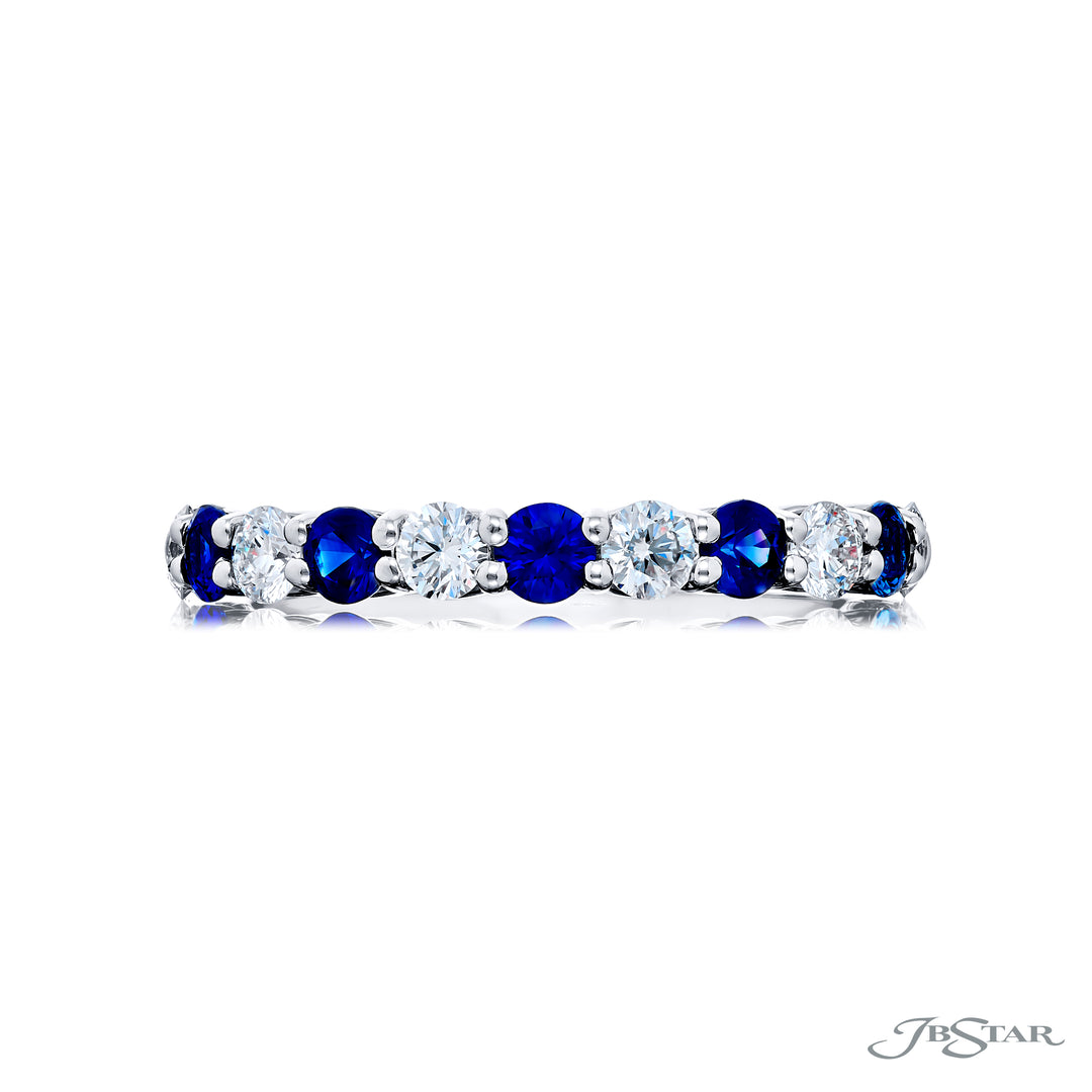 Elegance Elevated: Our classic single row Sapphire and Diamond Band. These stunning round sapphires accompany round diamonds and are handcrafted in pure platinum.