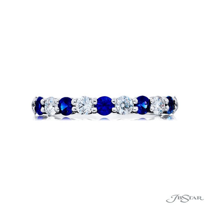 Elegance Elevated: Our classic single row Sapphire and Diamond Band. These stunning round sapphires accompany round diamonds and are handcrafted in pure platinum.