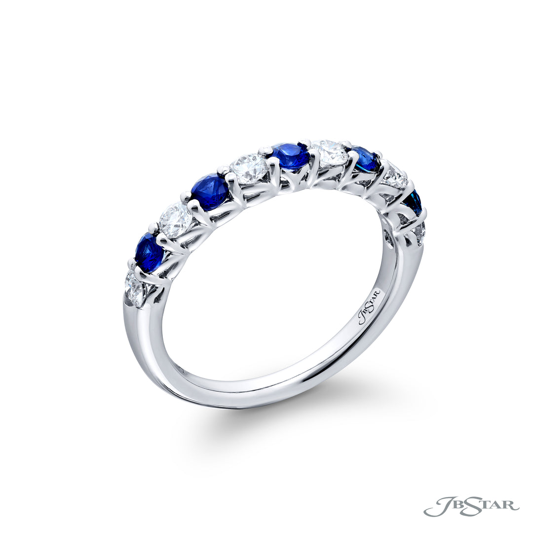 Elegance Elevated: Our classic single row Sapphire and Diamond Band. These stunning round sapphires accompany round diamonds and are handcrafted in pure platinum.
