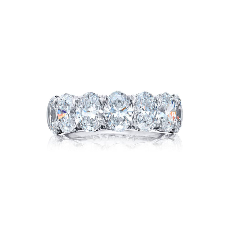Elegance Elevated: Our signature GIA certified Diamond Band. These seven beautiful oval diamonds are handcrafted in pure platinum.