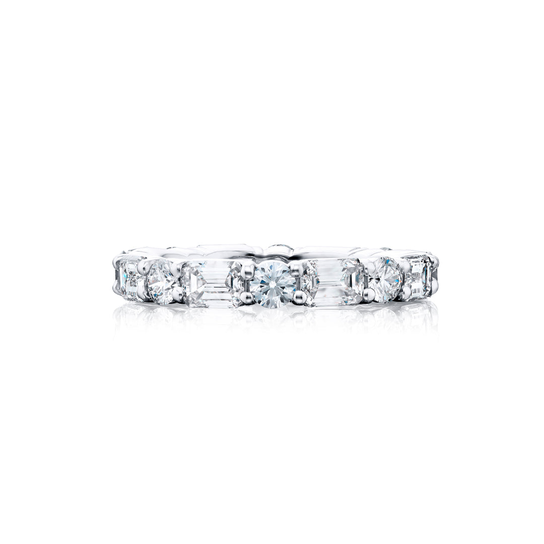 Alluring Eternity: Our stunning single row East-West 3.66 ctw. Diamond Eternity Band. These dazzling round and emerald-cut diamonds are handcrafted in pure platinum.