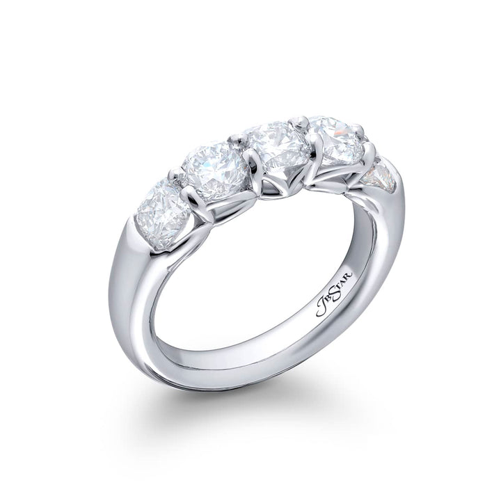 Elegance Elevated: Our classic single row Diamond Band. These stunning cushion-cut and round diamonds are handcrafted in pure platinum.