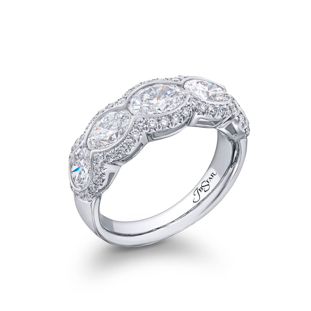 Elegance Elevated: Our signature East-West Bezel Diamond Band. These five gorgeous oval diamonds embraced by micro pave diamonds are handcrafted in pure platinum.