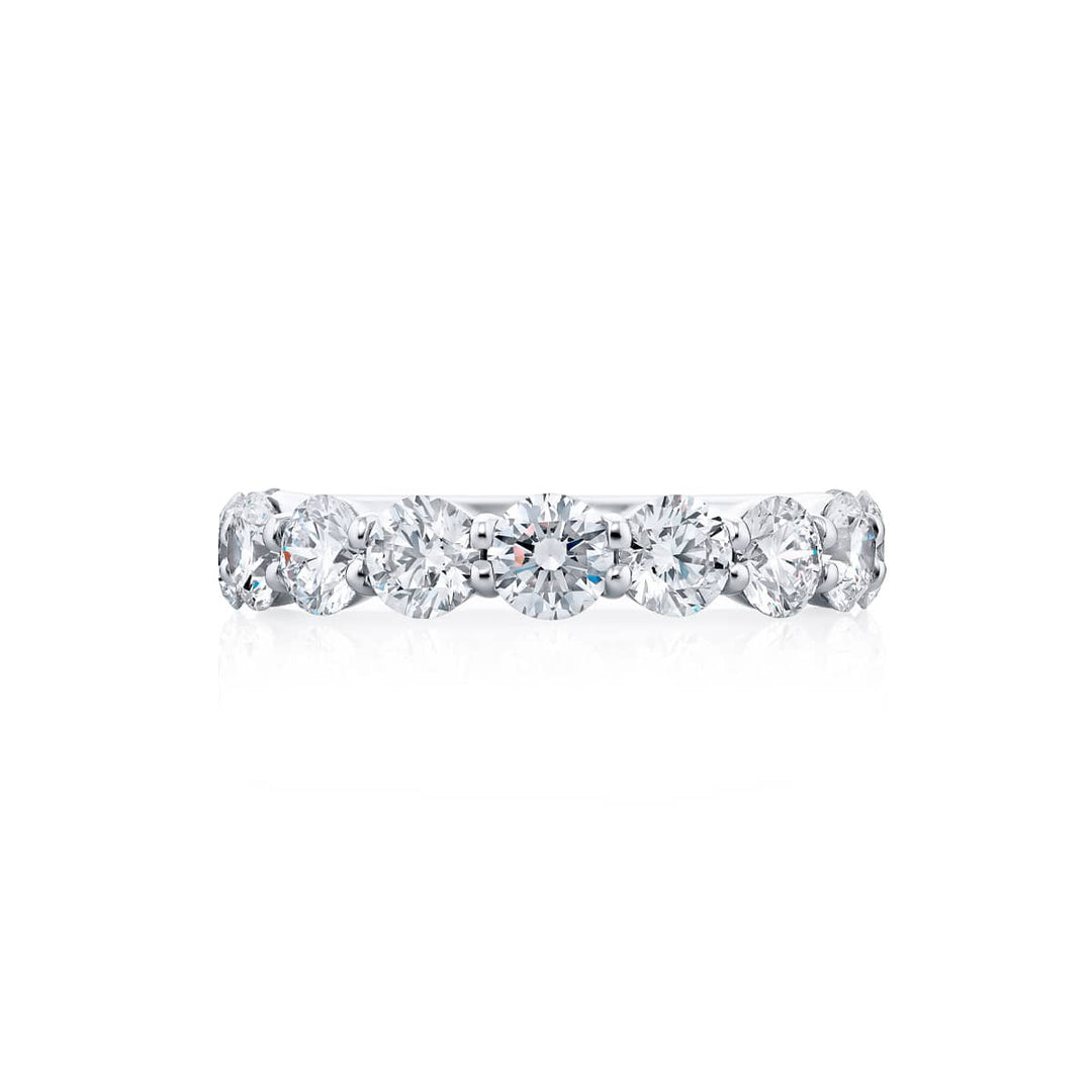 Elegance Elevated: Our stunning 2.56 ctw. Diamond Band. These eleven beautiful round diamonds are handcrafted in pure platinum.