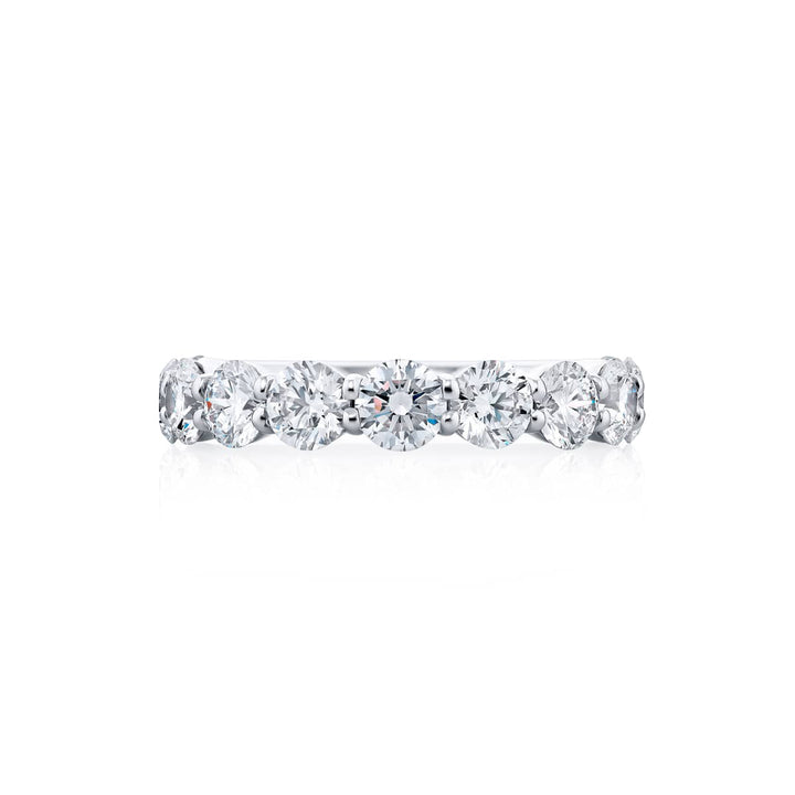 Elegance Elevated: Our stunning 2.56 ctw. Diamond Band. These eleven beautiful round diamonds are handcrafted in pure platinum.