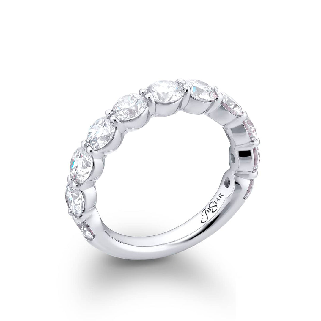 Elegance Elevated: Our stunning 2.56 ctw. Diamond Band. These eleven beautiful round diamonds are handcrafted in pure platinum.