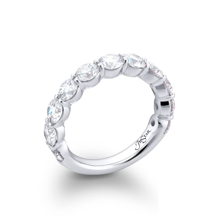 Elegance Elevated: Our stunning 2.56 ctw. Diamond Band. These eleven beautiful round diamonds are handcrafted in pure platinum.