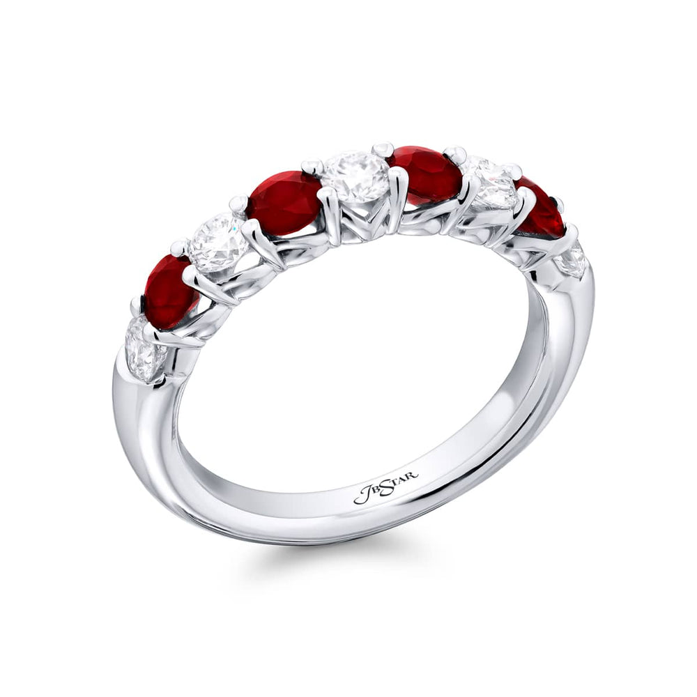 Elegance Elevated: Our stunning single row Ruby Band. These stunning round rubies accompany round diamonds and are handcrafted in pure platinum.