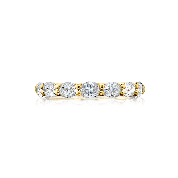 Elegance Elevated: Our stunning 1.23 ctw. East-West Diamond Band. These seven beautiful oval diamonds are handcrafted in 18KY gold.