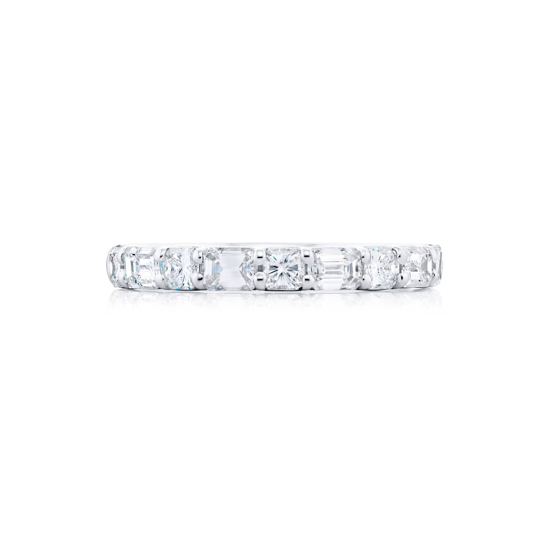 Elegance Elevated: Our stunning 1.08 ctw. East-West Diamond Band. These beautiful emerald-cut diamonds accompany radiant-cut diamonds and are handcrafted in pure platinum.
