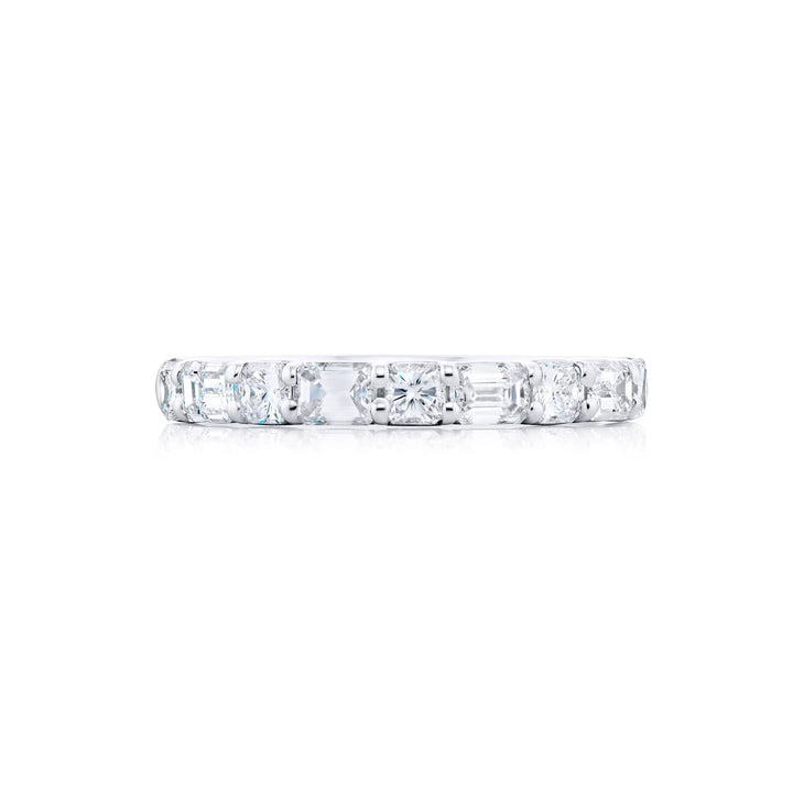 Elegance Elevated: Our stunning 1.08 ctw. East-West Diamond Band. These beautiful emerald-cut diamonds accompany radiant-cut diamonds and are handcrafted in pure platinum.