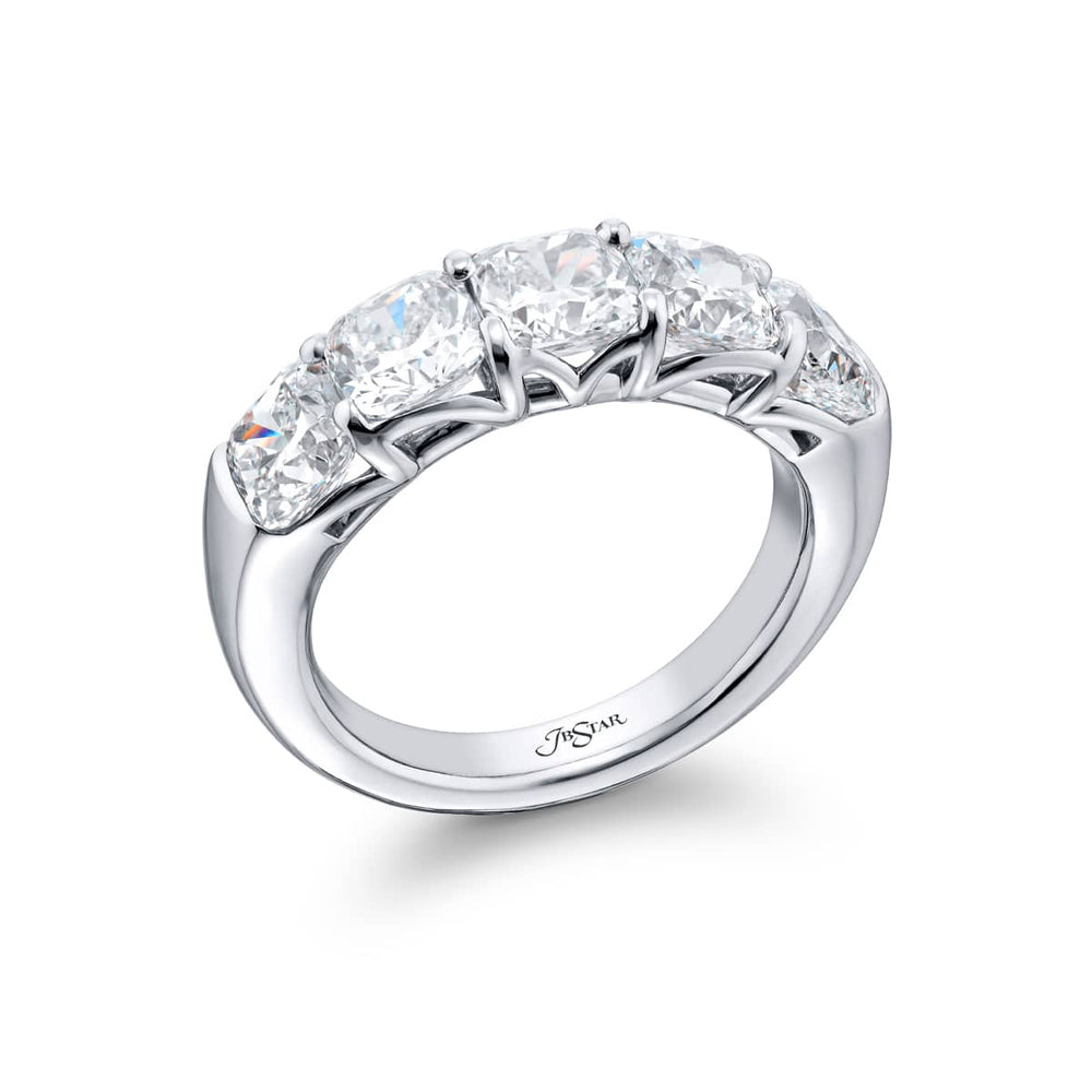 Elegance Elevated: Our classic 4.06 ctw. GIA certified Diamond Band. These five stunning cushion-cut diamonds are handcrafted in pure platinum.