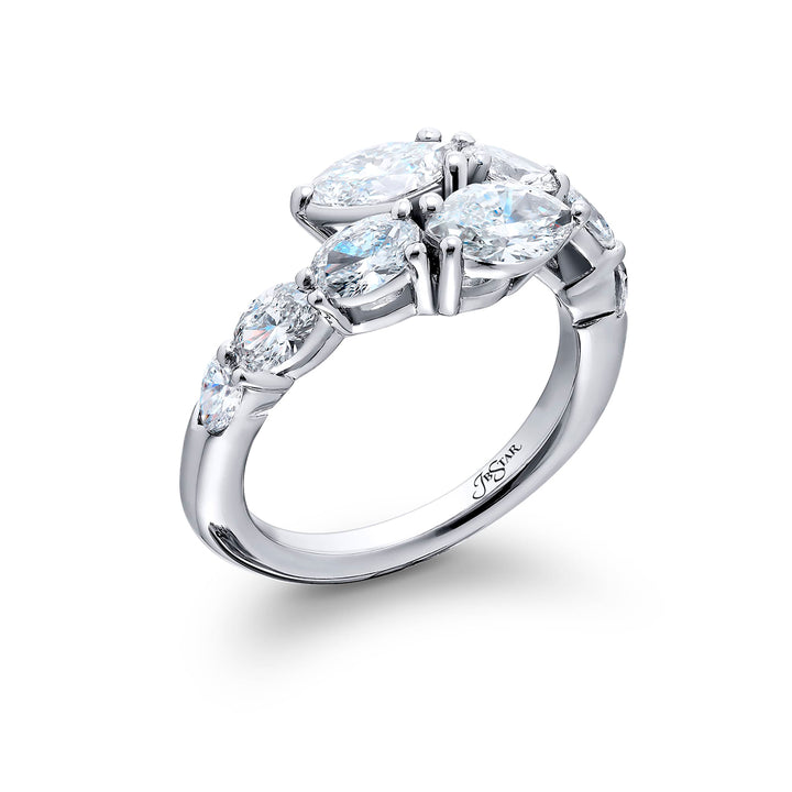 Dazzling Brilliance: Our signature Twogether Diamond Ring. These stunning pear-shaped diamonds accompanied by oval and marquise diamonds are handcrafted in pure platinum.