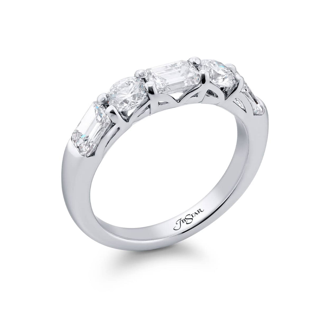 Elegance Elevated: Our classic single row East-West Diamond Band. These emerald-cut diamonds accompany round diamonds and are handcrafted in pure platinum.