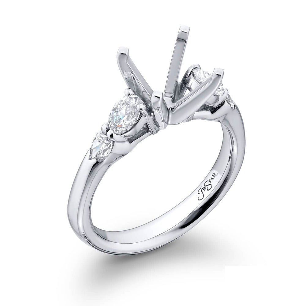 Dazzling Brilliance: Our beautiful Diamond Semi-mount. These two stunning oval diamonds accompanied by two pear-shaped diamonds handcrafted in pure platinum.