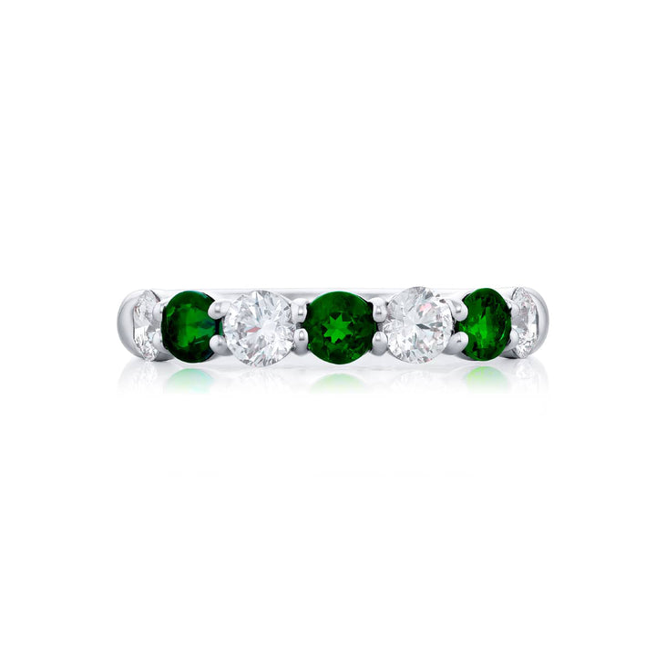 Elegance Elevated: Our signature  Emerald and Diamond Band. These beautiful round emeralds blended with round diamonds are handcrafted in pure platinum.