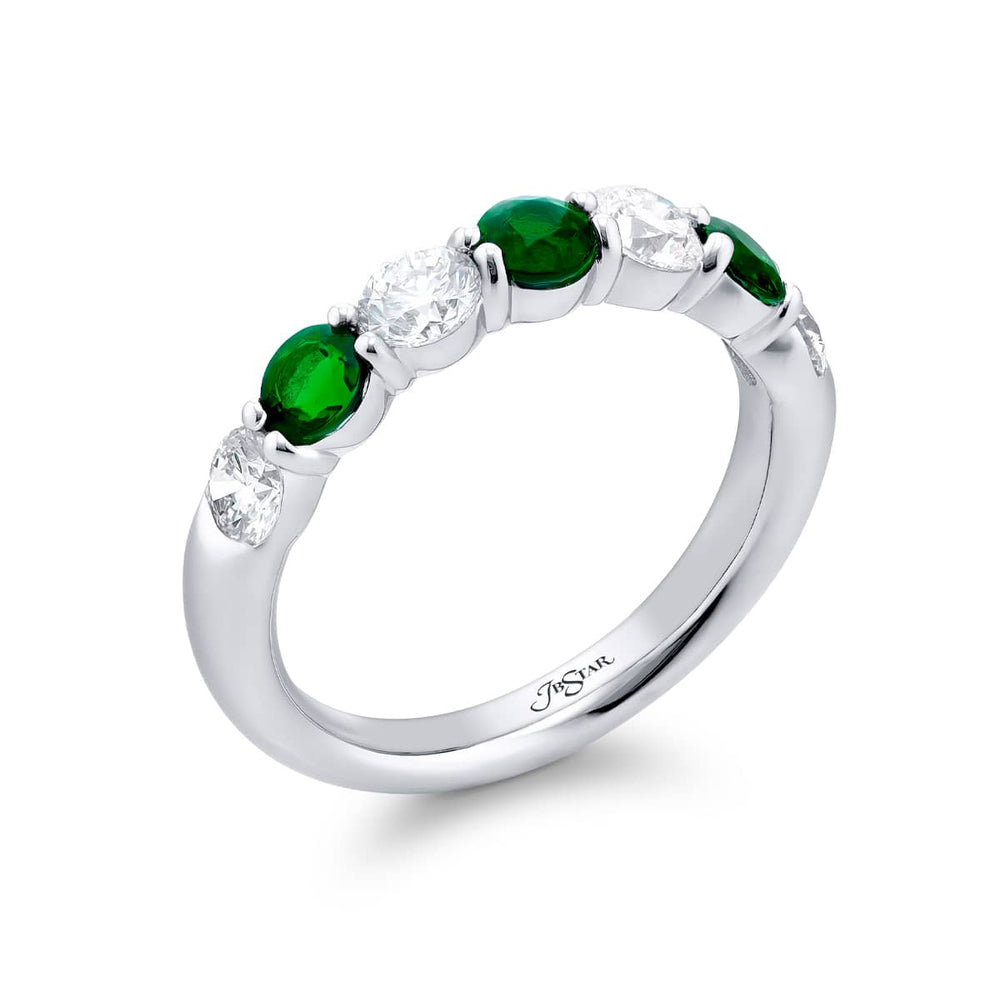 Elegance Elevated: Our signature  Emerald and Diamond Band. These beautiful round emeralds blended with round diamonds are handcrafted in pure platinum.