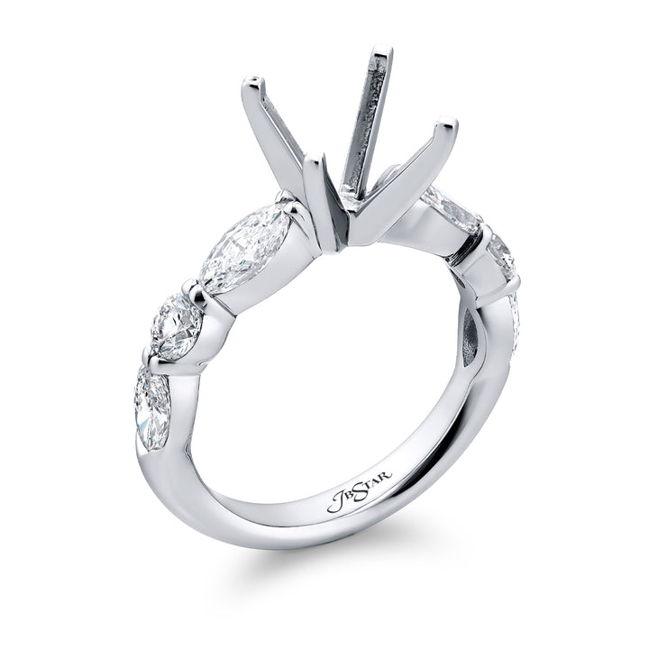 Dazzling Brilliance: Our timeless East-West Diamond Semi-mount. These two beautiful marquise diamonds and four dazzling round diamonds are handcrafted in pure platinum.