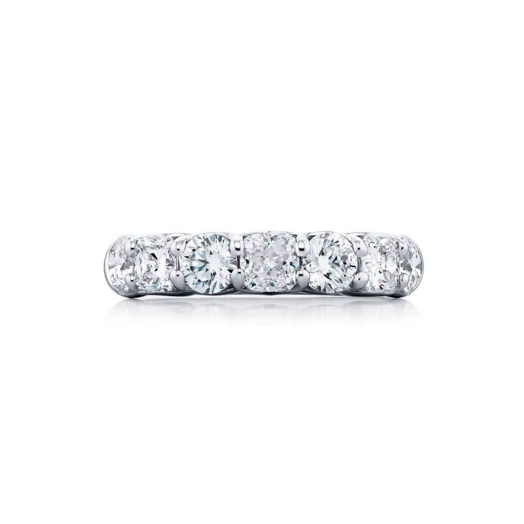 Elegance Elevated: Our classic 2.20 ctw. Diamond Band. These beautiful cushion-cut diamonds accompany round diamonds and are handcrafted in pure platinum.