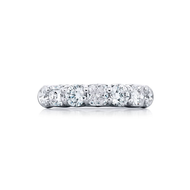 Elegance Elevated: Our classic 2.20 ctw. Diamond Band. These beautiful cushion-cut diamonds accompany round diamonds and are handcrafted in pure platinum.