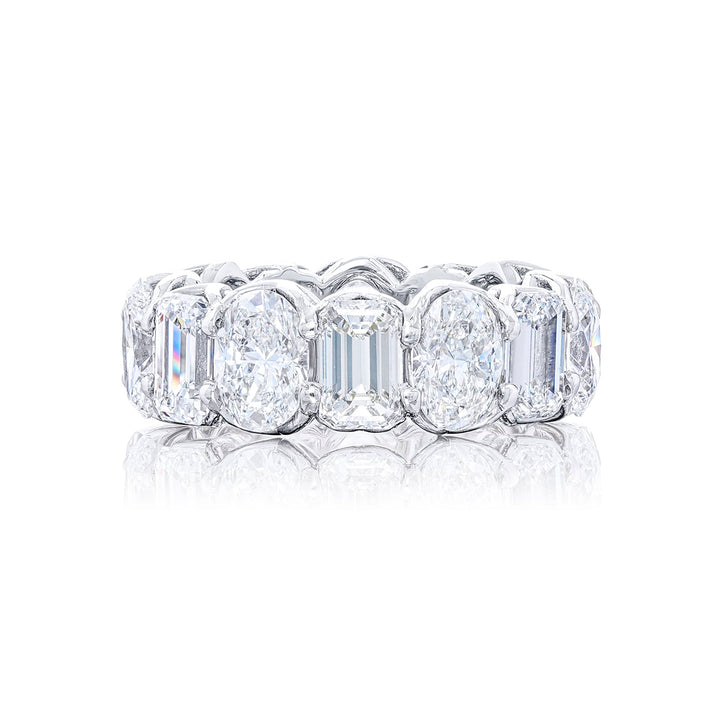 Beautiful eternity band featuring 7 emerald-cut and 7 oval diamonds in a shared prong setting. Handcrafted in pure platinum.