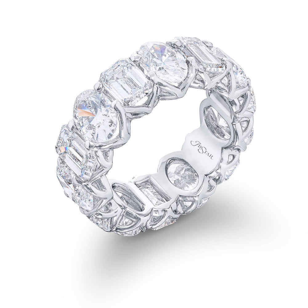 Beautiful eternity band featuring 7 emerald-cut and 7 oval diamonds in a shared prong setting. Handcrafted in pure platinum.