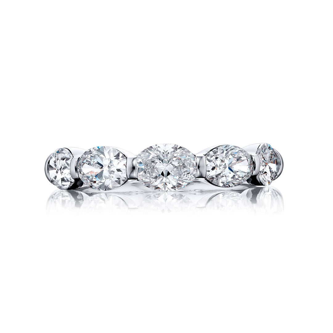 Elegance Elevated: Our signature 2.17 ctw. East-West Bar Set Diamond Band. These five beautiful oval diamonds are handcrafted in pure platinum.