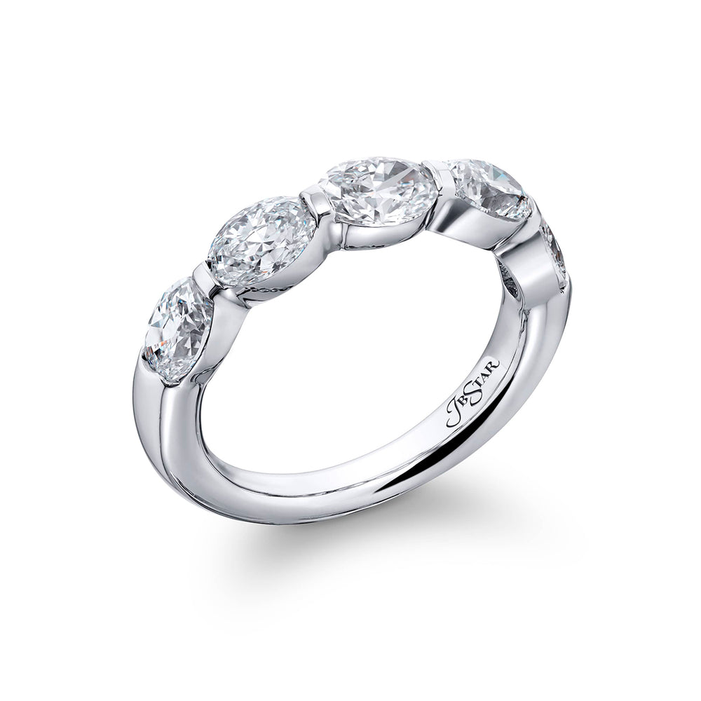 Elegance Elevated: Our signature 2.17 ctw. East-West Bar Set Diamond Band. These five beautiful oval diamonds are handcrafted in pure platinum.