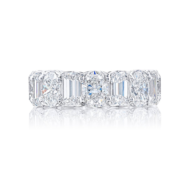 Beautiful eternity band featuring 8 emerald-cut and 8 oval diamonds in a shared prong setting. Handcrafted in pure platinum.