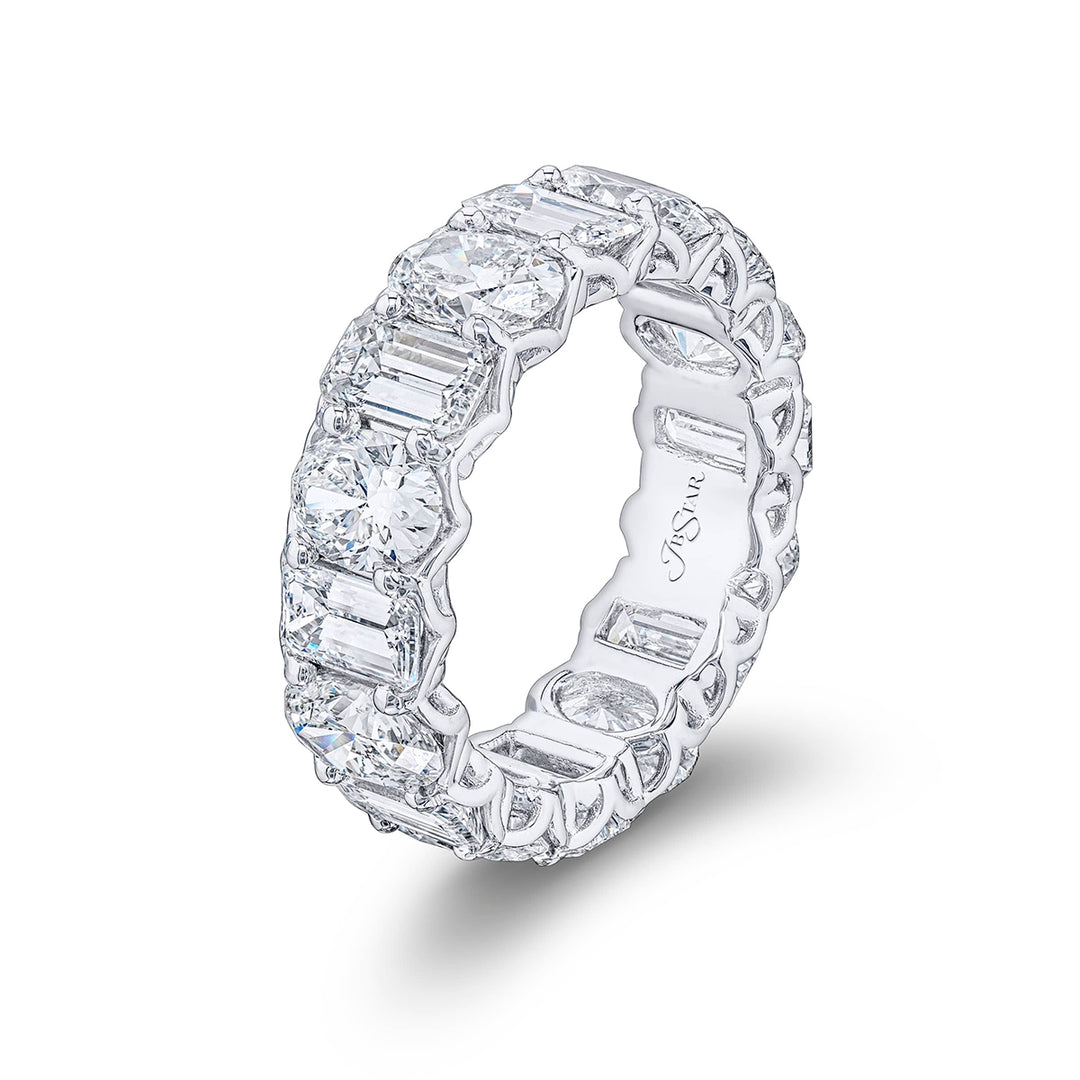 Beautiful eternity band featuring 8 emerald-cut and 8 oval diamonds in a shared prong setting. Handcrafted in pure platinum.