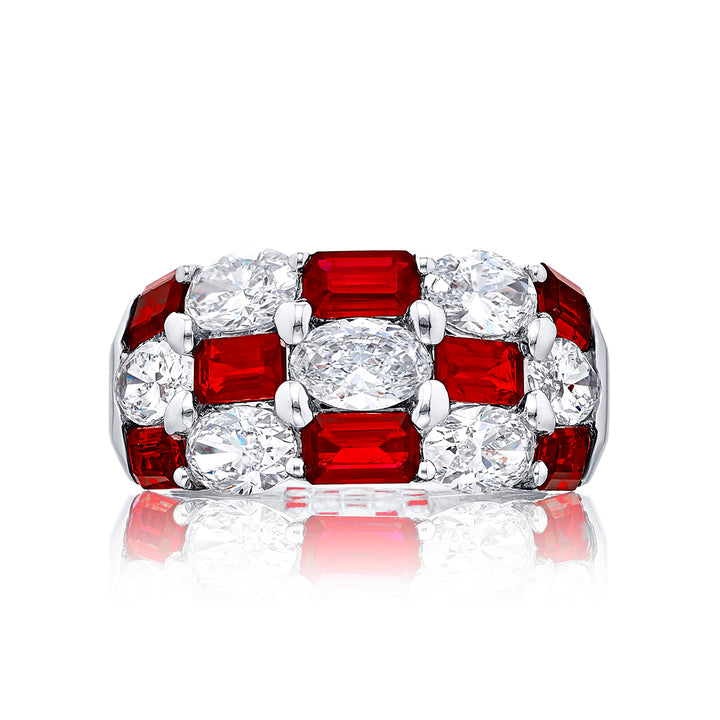 Elegance Elevated: Our iconic three-row Ruby and Diamond Band. These alternating emerald-cut rubies blend with oval diamonds and are handcrafted in pure platinum.